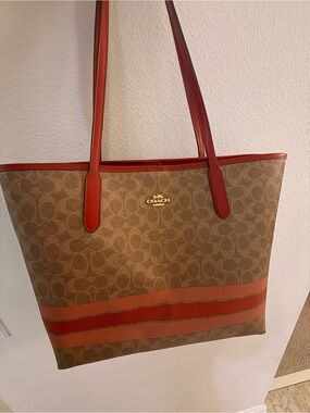 Coach Brown Monogram Tote with Red Trim